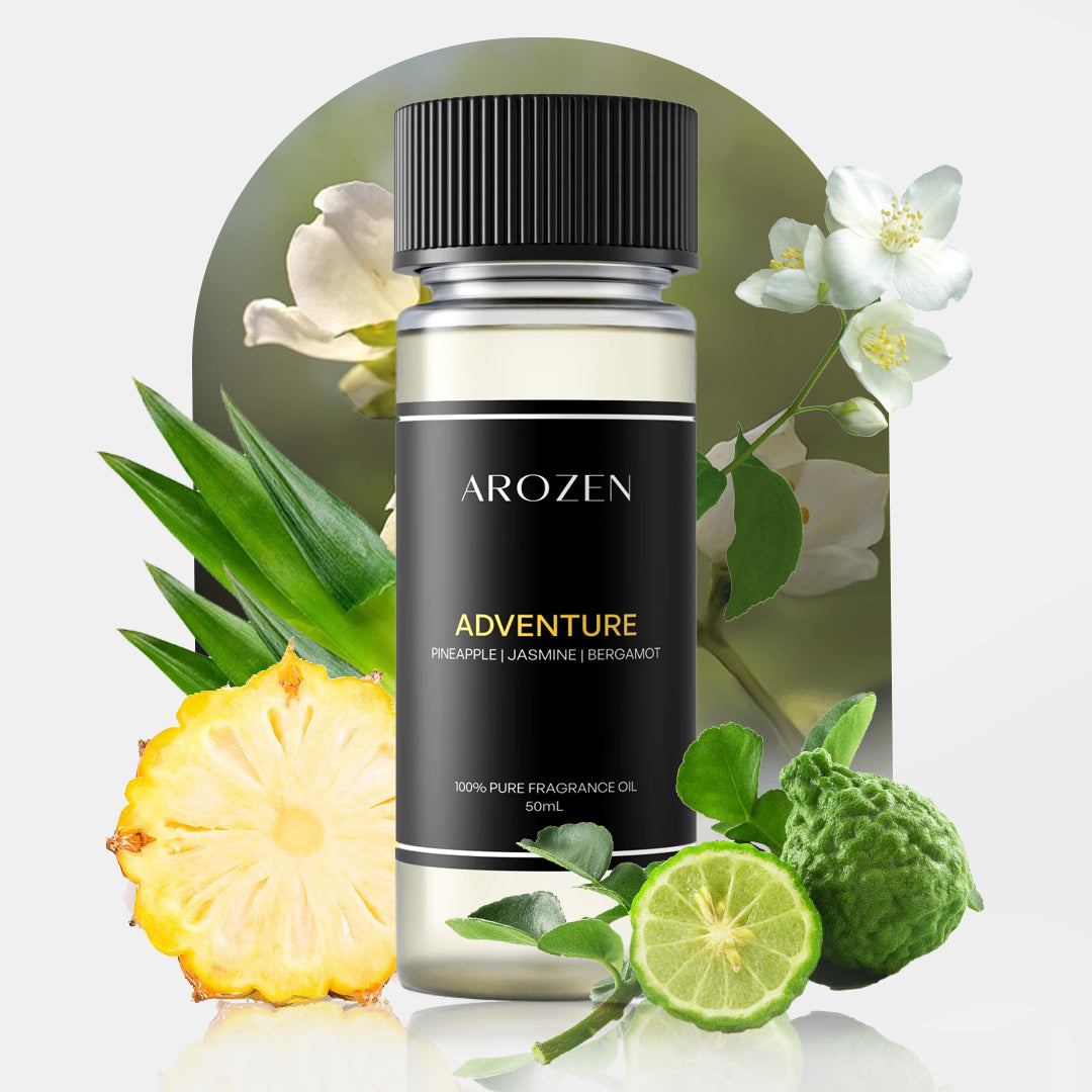 
                  
                    A bottle of Arozen ADVENTURE Fragrance Oil is surrounded by pineapple, bergamot, and jasmine flowers against a blurred floral backdrop. The label features pineapple, jasmine, and bergamot as its main scent notes.
                  
                