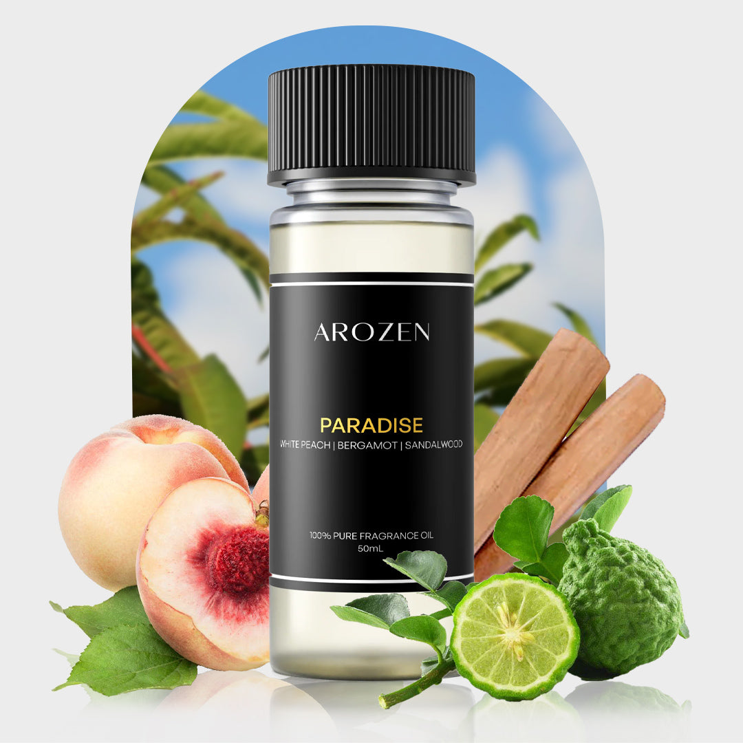 
                  
                    A bottle of PARADISE fragrance oil is shown with fresh white peach, bergamot, sandalwood, green leaves, and a blurred leafy background, highlighting its tropical scent ideal for your Paradise Electric Scent Diffuser.
                  
                